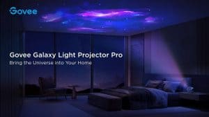 Govee Galaxy Light Projector Pro projecting a galaxy onto a bedroom ceiling.
