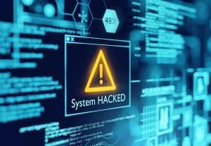 System Hacked popup over a computer screen